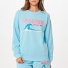 Women Vintage Havana Sweatshirts | Tropical Blue Malibu Jet Setter Surf Wash Crewneck