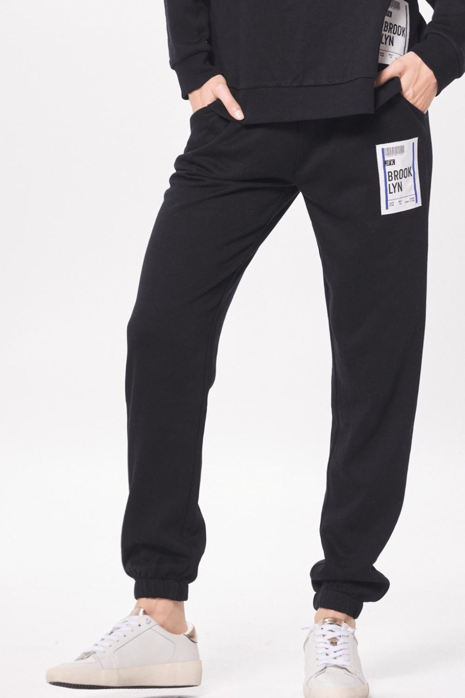 Women Vintage Havana Joggers | Black W/Blue Brooklyn Boarding Pass Jogger